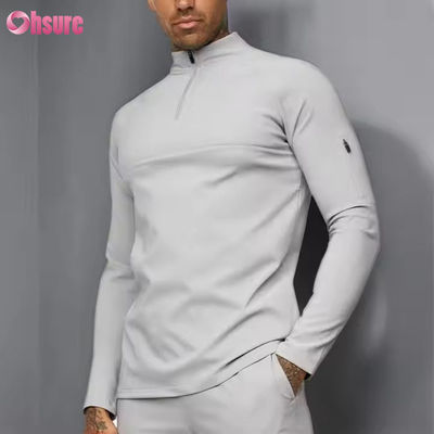 Entrenamiento personalizado Deportes activos Usar Slim Fit 1/4 Cuarto Zip Jogging Track Top Men Compresión Gimnasio Camisa de manga larga