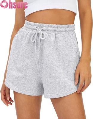 Pantalones cortos deportivos de cintura alta de secado rápido para mujer, faldas pantalón transpirables con bolsillos para correr y hacer ejercicio, con decoración de patrón de moda