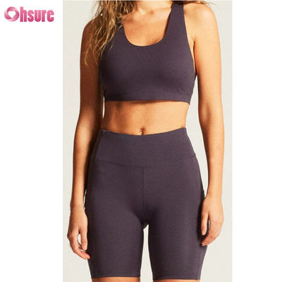 Nuevo estilo ropa activa personalizada de alta calidad para yoga ropa deportiva al aire libre pantalones cortos logotipo personalizado acondicionamiento físico sexys Cross Back sujetador de yoga