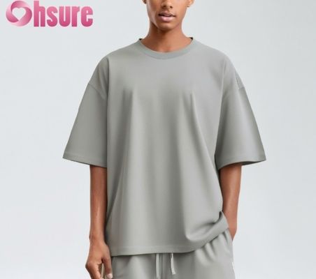 Camiseta de algodón premium para hombre 2025, ajuste regular casual, suave, transpirable, patrón liso, tejido de punto, venta al por mayor