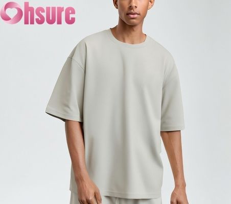Camiseta de algodón premium para hombre 2025, ajuste regular casual, suave, transpirable, patrón liso, tejido de punto, venta al por mayor