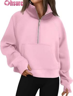 Pullover de lana cortada con media cremallera de mujer con capucha.