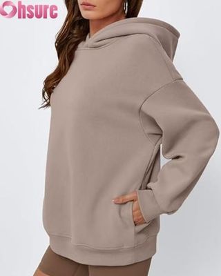 Mujeres con sudadera de color sólido con bolsillo. Vestidos cálidos de invierno. OEM ODM disponible.