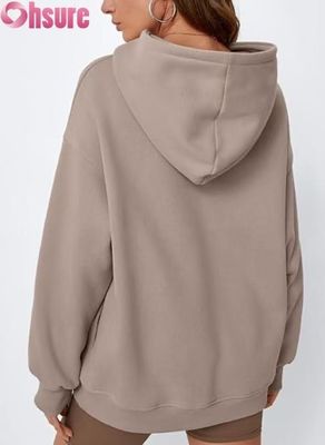 Mujeres con sudadera de color sólido con bolsillo. Vestidos cálidos de invierno. OEM ODM disponible.