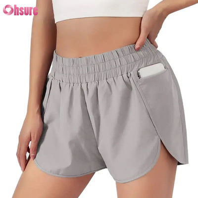Calzoncillos de atletismo de secado rápido para mujeres Calzoncillos de atletismo de secado rápido para deportes con capa de cintura elástica Vestidos deportivos transpirables