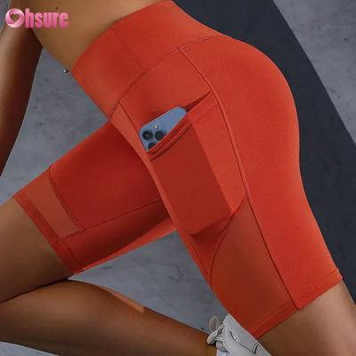 Impresión de logotipo personalizado de venta caliente de bolsillo de malla de costura cintura alta glúteos levantamiento adelgazamiento calzoncillos de yoga leggings al por mayor