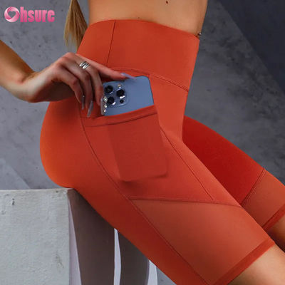 Impresión de logotipo personalizado de venta caliente de bolsillo de malla de costura cintura alta glúteos levantamiento adelgazamiento calzoncillos de yoga leggings al por mayor