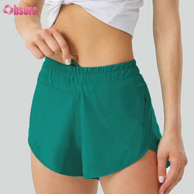 Calzoncillos de yoga para mujeres con pantalones de entrenamiento de poliéster seco rápido y altamente transpirable con bolsillos de cintura elásticos para deportes y carreras