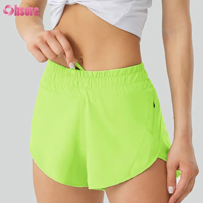 Calzoncillos de yoga para mujeres con pantalones de entrenamiento de poliéster seco rápido y altamente transpirable con bolsillos de cintura elásticos para deportes y carreras