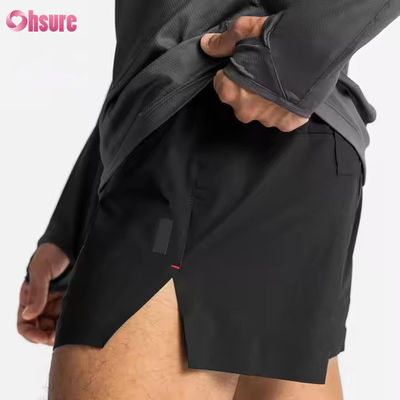 Bolsillos de cremallera personalizados cintura elástica deportes activos de ropa masculina Jacquard impresión entrenamiento corriendo calzoncillos de gimnasio