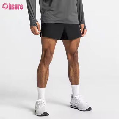 Bolsillos de cremallera personalizados cintura elástica deportes activos de ropa masculina Jacquard impresión entrenamiento corriendo calzoncillos de gimnasio