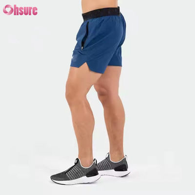 Logotipo personalizado en cinturón Poliéster Bolsillos Split Hem Pour Hombres Deportes Activos Hombres Entrenamiento Gimnasio Calzoncillos Atléticos Para Hombres