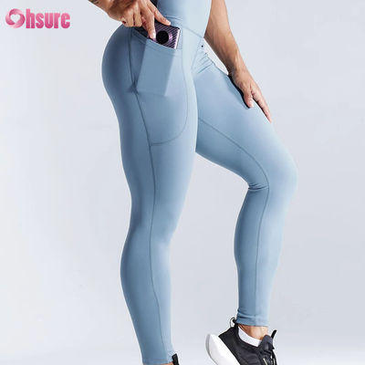 Mallas deportivas de cintura alta de secado rápido para fitness, leggings de yoga con realce de glúteos, mallas con bolsillo lateral para mujer