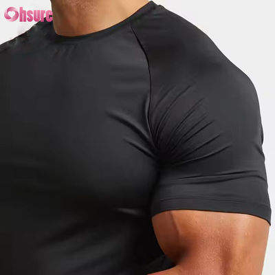 Polyester personalizado Spandex Ligero Slim Fit Raglan Manga Entrenamiento muscular rápido Top Gimnasio camiseta para hombres