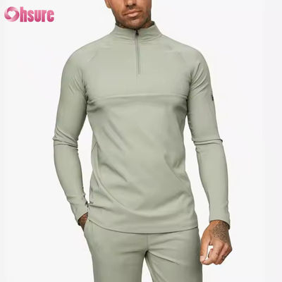 Entrenamiento personalizado Deportes activos Usar Slim Fit 1/4 Cuarto Zip Jogging Track Top Men Compresión Gimnasio Camisa de manga larga