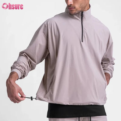 Chaqueta tejida impermeable de alta calidad con cremallera de cuarto de grado para hombres con fondo ajustable con cremallera media diseño de cuello simulado para invierno