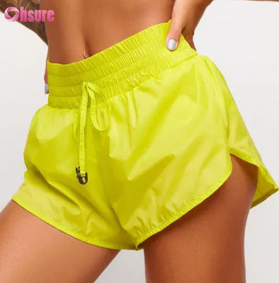 Nuevos shorts de yoga transpirables y sueltos anti-caminata para correr al aire libre, ocio, 100% nailon, shorts deportivos para mujer, pantalones cortos saludables