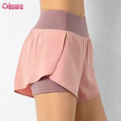 Venta caliente Calzoncillos de carreras de cintura alta para mujeres Calzoncillos rápidos secos de doble capa Calzoncillos de entrenamiento atlético Bolsillos respirables Calzoncillos de yoga para ejercicios físicos