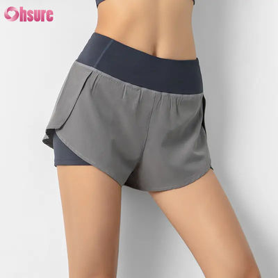 Venta caliente Calzoncillos de carreras de cintura alta para mujeres Calzoncillos rápidos secos de doble capa Calzoncillos de entrenamiento atlético Bolsillos respirables Calzoncillos de yoga para ejercicios físicos