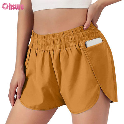 Calzoncillos deportivos de cintura alta de secado rápido para mujeres con elástico Calzoncillos de moda para correr y hacer ejercicio con bolsillos