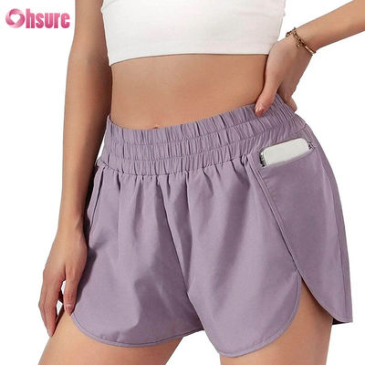 Calzoncillos deportivos de cintura alta de secado rápido para mujeres con elástico Calzoncillos de moda para correr y hacer ejercicio con bolsillos