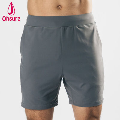 Diseño de logotipo personalizado por el fabricante, material ligero, elástico en cuatro direcciones, bolsillos delanteros profundos, pantalones cortos deportivos para hombre, pantalones cortos de entrenamiento para gimnasio