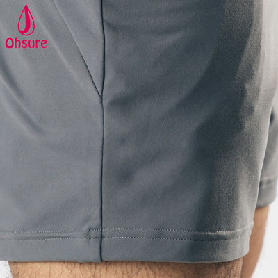 Diseño de logotipo personalizado por el fabricante, material ligero, elástico en cuatro direcciones, bolsillos delanteros profundos, pantalones cortos deportivos para hombre, pantalones cortos de entrenamiento para gimnasio