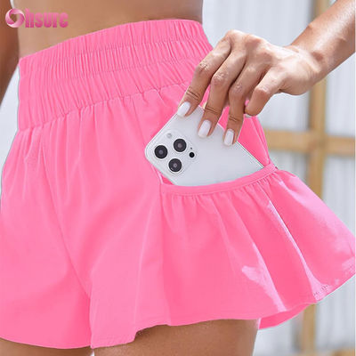 Mujeres calzoncillos para correr de cintura alta Calzoncillos para entrenamiento Salón de ejercicios Calzoncillos secos rápidos con bolsillos de color sólido Calzoncillos de secado rápido