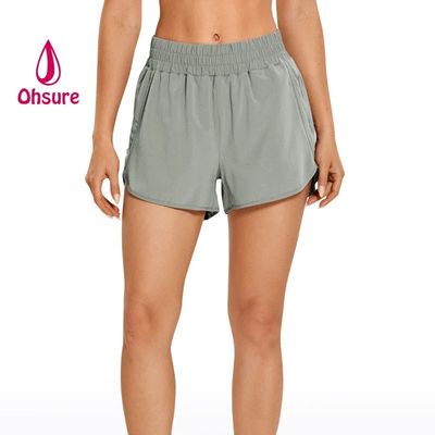 Pantalones cortos deportivos de secado rápido, nuevos pantalones cortos de cintura alta con diseño casual para mujer, logotipo personalizado, tallas grandes, tejido estampado, soporte para muestra personalizada
