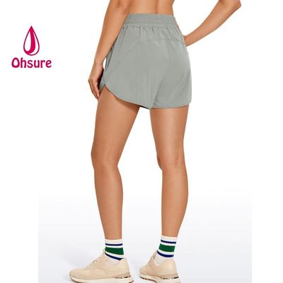 Pantalones cortos deportivos de secado rápido, nuevos pantalones cortos de cintura alta con diseño casual para mujer, logotipo personalizado, tallas grandes, tejido estampado, soporte para muestra personalizada