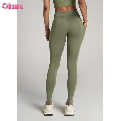 Mallas deportivas texturizadas Pantalones deportivos de yoga fitness con diseño de cremallera Mallas de yoga deportivas para mujer