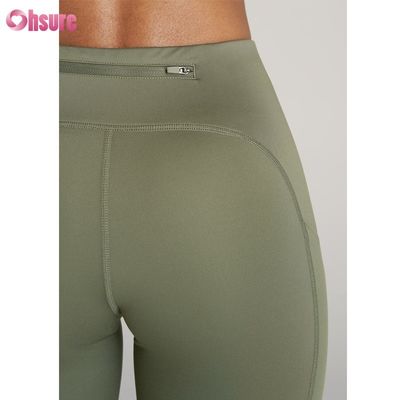 Mallas deportivas texturizadas Pantalones deportivos de yoga fitness con diseño de cremallera Mallas de yoga deportivas para mujer