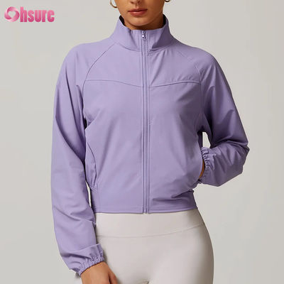 Chaquetas de entrenamiento con cremallera de alta calidad para mujer, fitness personalizado, cuello alzado, tops de yoga a prueba de viento, venta al por mayor, tejido de invierno, insignia