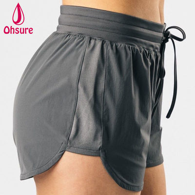 Pantalones cortos deportivos atléticos de cintura alta de diseño OEM de alta calidad para mujer, fitness, gimnasio, correr, yoga, pantalones cortos, tejido casual