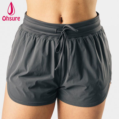 Pantalones cortos deportivos atléticos de cintura alta de diseño OEM de alta calidad para mujer, fitness, gimnasio, correr, yoga, pantalones cortos, tejido casual