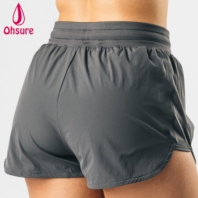 Pantalones cortos deportivos atléticos de cintura alta de diseño OEM de alta calidad para mujer, fitness, gimnasio, correr, yoga, pantalones cortos, tejido casual