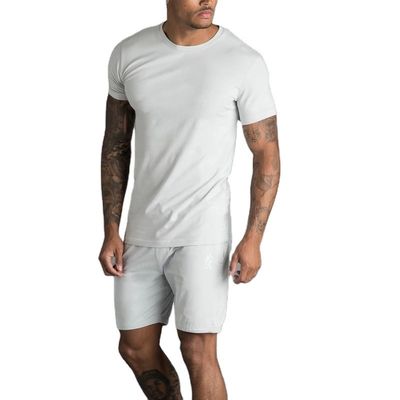 Proveedores de ropa para hombre al por mayor Camiseta de algodón para hombre de alta calidad Talla y logotipo personalizados Ajuste holgado Camiseta deportiva para hombre