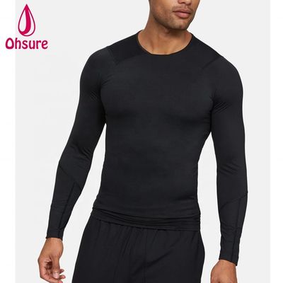 Venta al por mayor de ropa de gimnasia de oferta Camiseta de compresión para hombre de ajuste delgado Ropa deportiva para hombre Camisetas de manga larga para hombre Jersey Cuello redondo informal en blanco