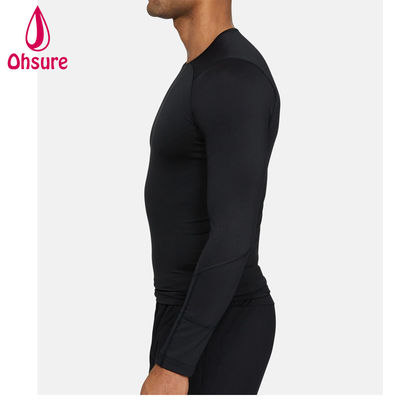 Venta al por mayor de ropa de gimnasia de oferta Camiseta de compresión para hombre de ajuste delgado Ropa deportiva para hombre Camisetas de manga larga para hombre Jersey Cuello redondo informal en blanco