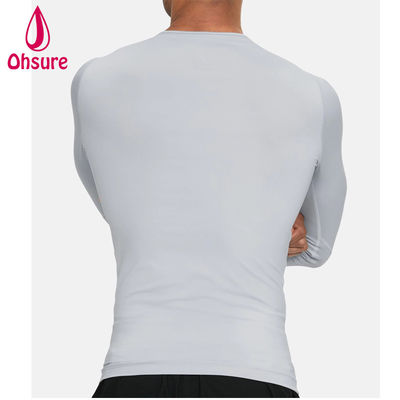 Venta al por mayor de ropa de gimnasia de oferta Camiseta de compresión para hombre de ajuste delgado Ropa deportiva para hombre Camisetas de manga larga para hombre Jersey Cuello redondo informal en blanco