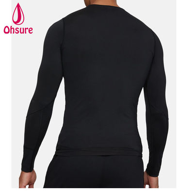Venta al por mayor de ropa de gimnasia de oferta Camiseta de compresión para hombre de ajuste delgado Ropa deportiva para hombre Camisetas de manga larga para hombre Jersey Cuello redondo informal en blanco